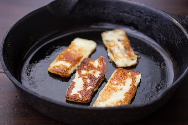 halloumi cooking in a pan 