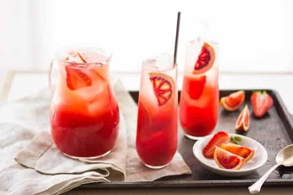 Strawberry Blood Orange Rum Punch on a serving tray