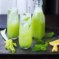 mint celery soda in glasses on a tray