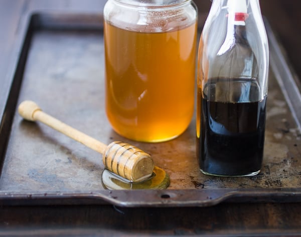 honey and vinegar on a tray 