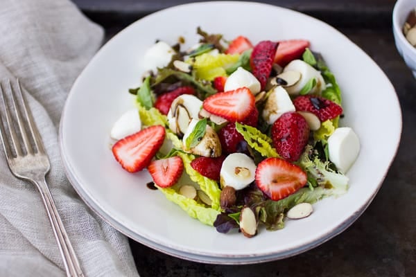 strawberry caprese salad on a plate 