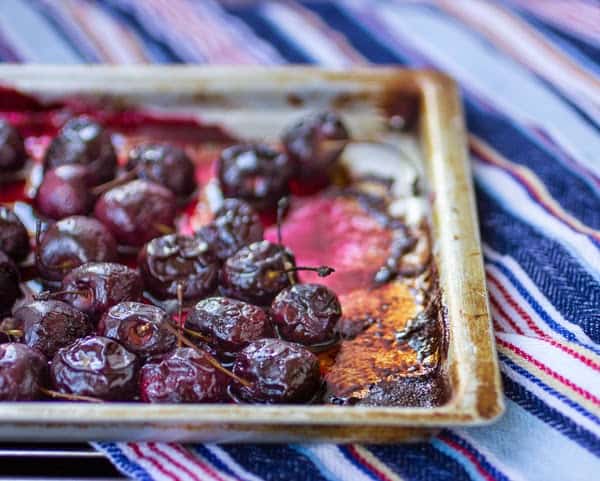 roasted cherries on a tray 