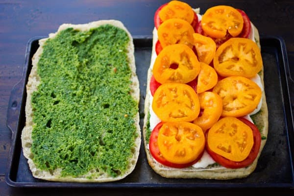 pesto and tomatoes on bread 