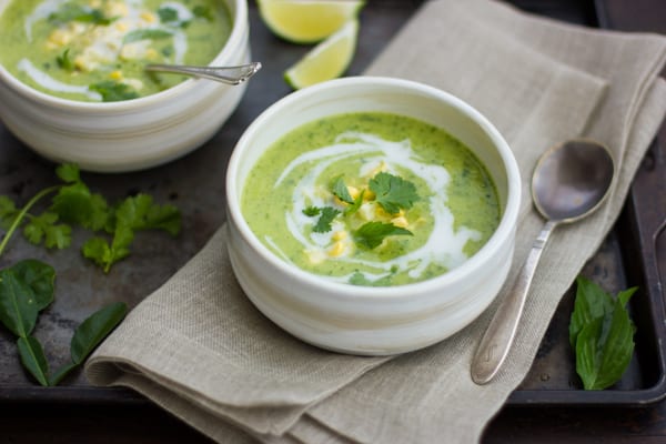 Creamy Thai Zucchini and Corn Soup on a table 