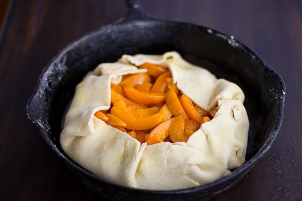 fruit and dough in skillet