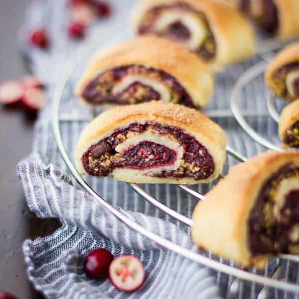 delicious Gluten Free Rugelach with Cranberry Jam, Chocolate, and Walnuts on wire rack