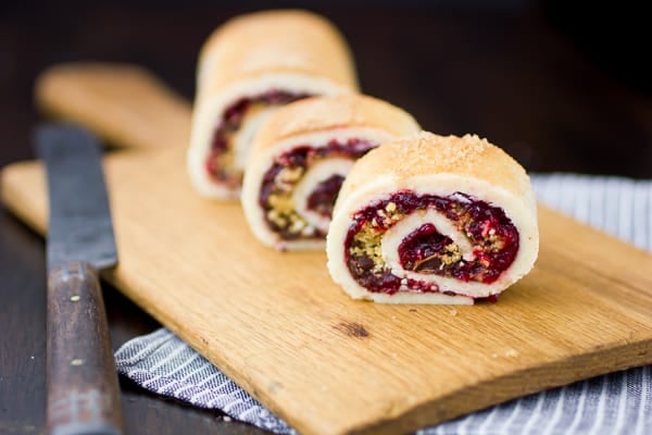 Gluten Free Rugelach with Cranberry Jam & Chocolate on a chopping board