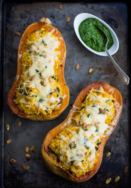  Vegetarian Stuffed Butternut Squash with Mushrooms, Millet, and Kale Pesto o baking tray 