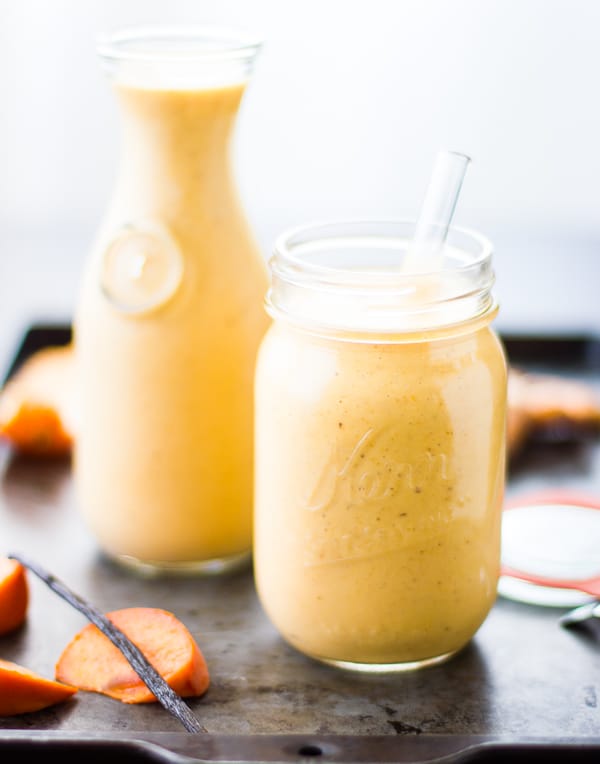 jars of Persimmon and Tangerine Smoothie with Vanilla, Ginger and Turmeric 