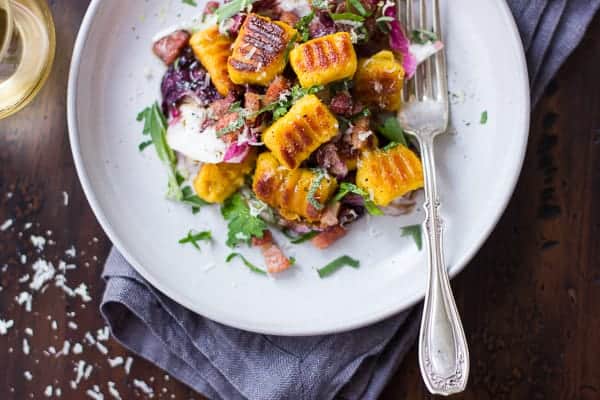 plate of delicious Gluten-Free Pumpkin Ricotta Gnocchi with Pancetta and Seared Radicchi