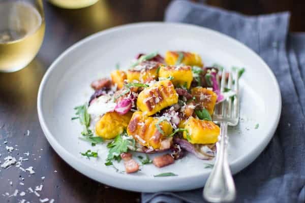 plate of Gluten-Free Pumpkin Ricotta Gnocchi with Pancetta and Seared Radicchio