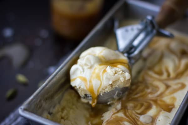 Smoked Cardamom Ice Cream with Salty Honey Caramel Swirl in a scoop