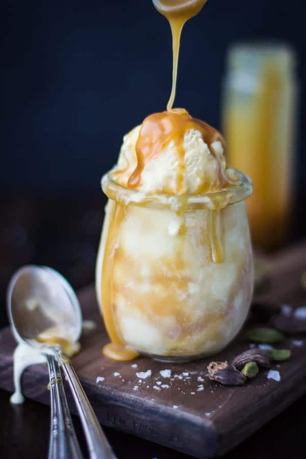Smoked Cardamom Ice Cream with Salty Honey Caramel Swirl in a glass
