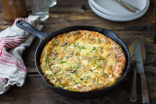 skillet of Potato and Green Garlic Crustless Quiche with Goat Cheese, Gruyère, and Chives {Gluten-Free}