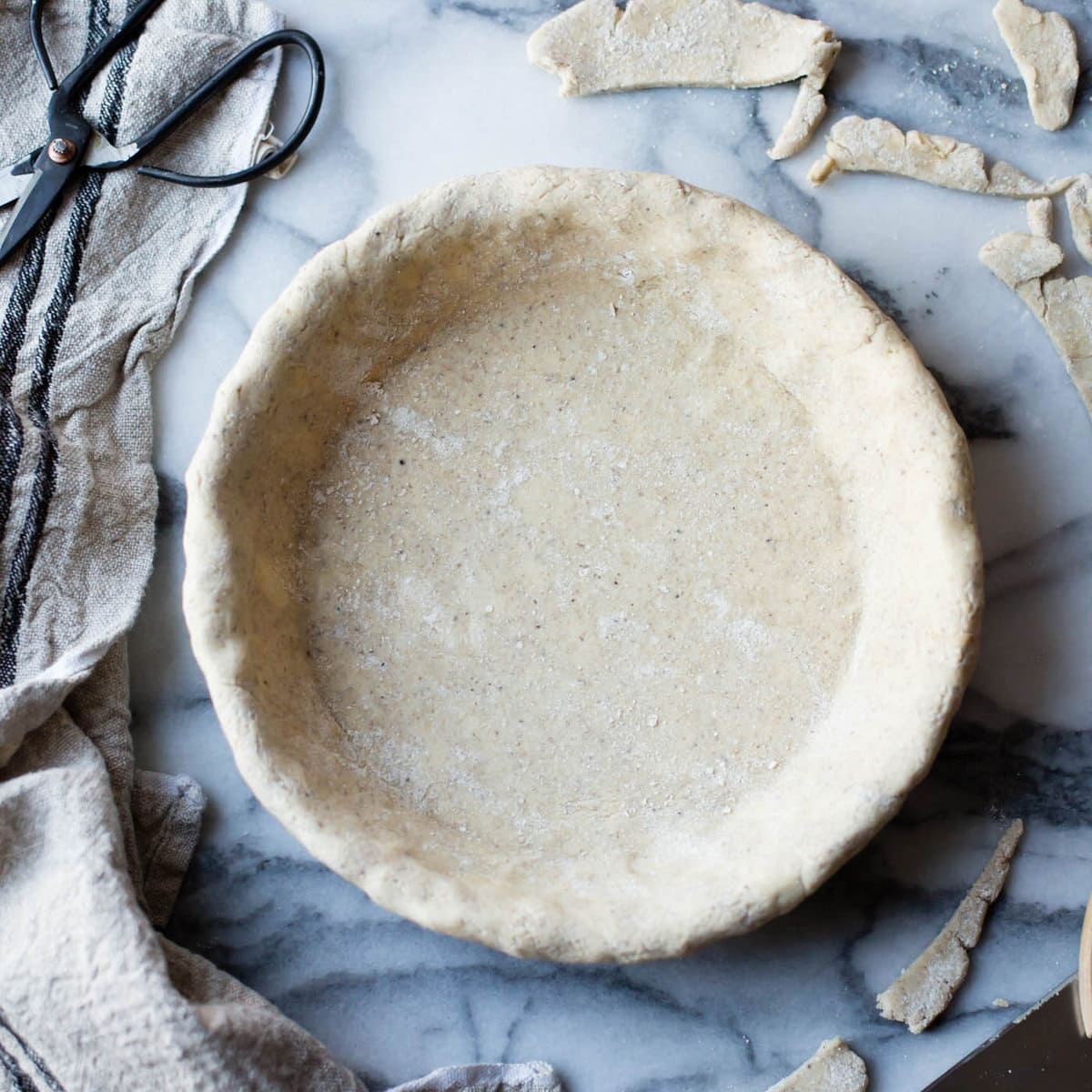 the pie crust has been shaped in a pan