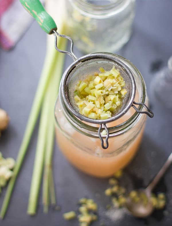 lemongrass in sieve over jar