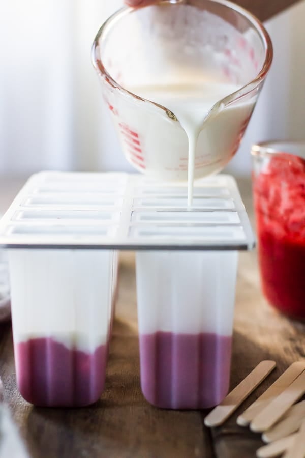 popsicle mix poured into mold 