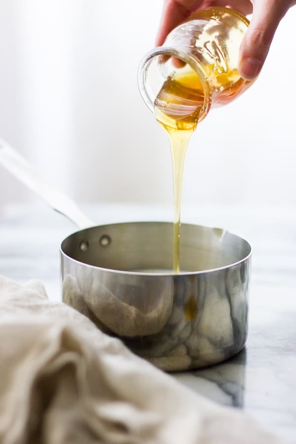 honey poured into pot