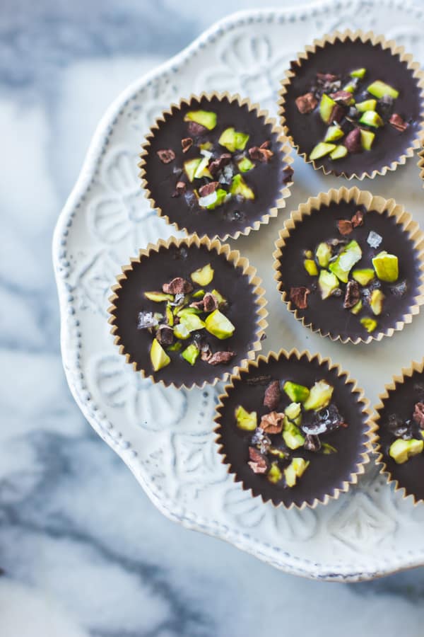 overhead shot of Raw Chocolate + Pistachio Butter Cups