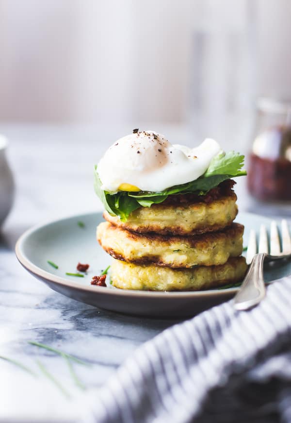 side shot of Savory Spaghetti Squash Cakes with Poached Eggs and Harissa {Gluten-Free}