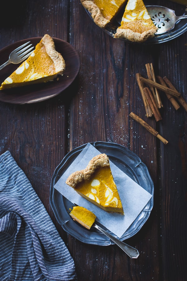 top down shot of slices of Kabocha Pumpkin Buttermilk Pie with a Crème Fraîche Swirl {Gluten-Free} 