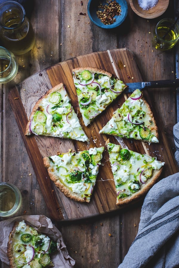 top down shot of Smoky Brussels Sprout Pizza with Lemon + Chile 