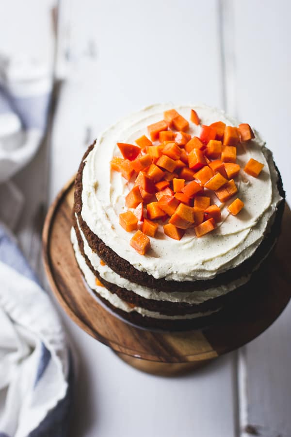 top down shot of Two-Persimmon Layer Cake with Vanilla Bourbon Cream Cheese Frosting
