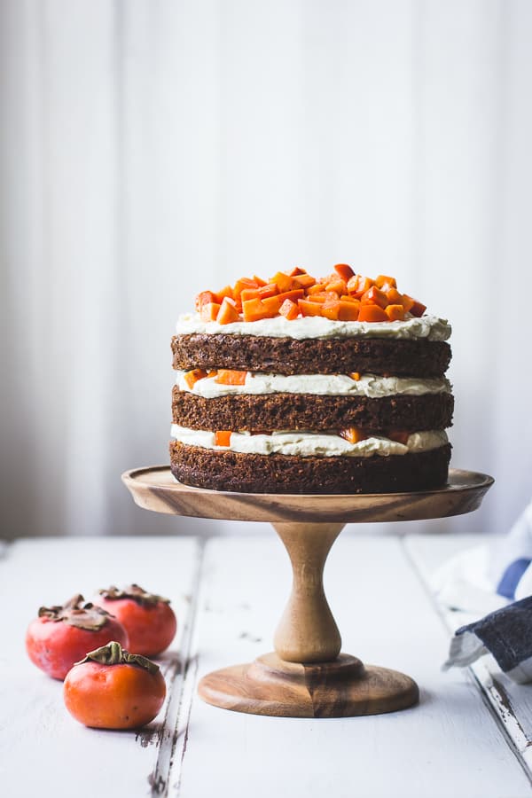Two-Persimmon Layer Cake with Vanilla Bourbon Cream Cheese Frosting on stand 