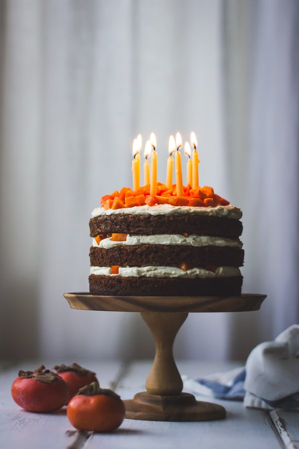 cake on stand with candles