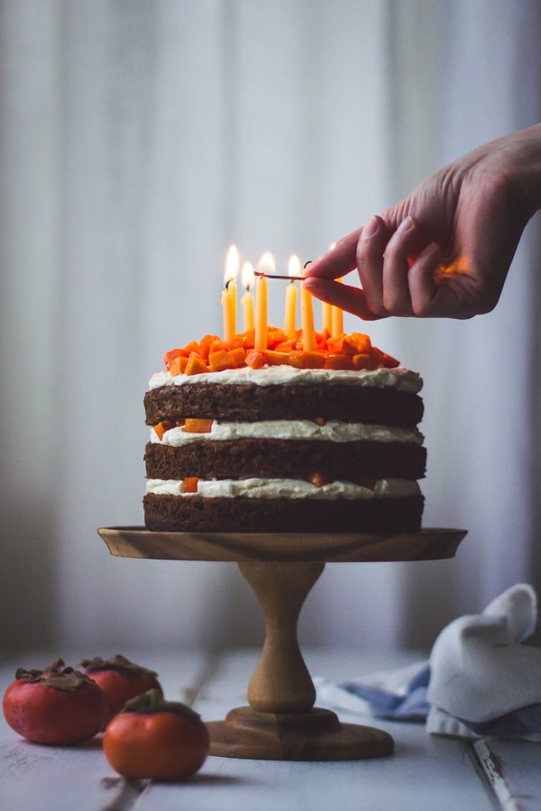 lighting candles on cake