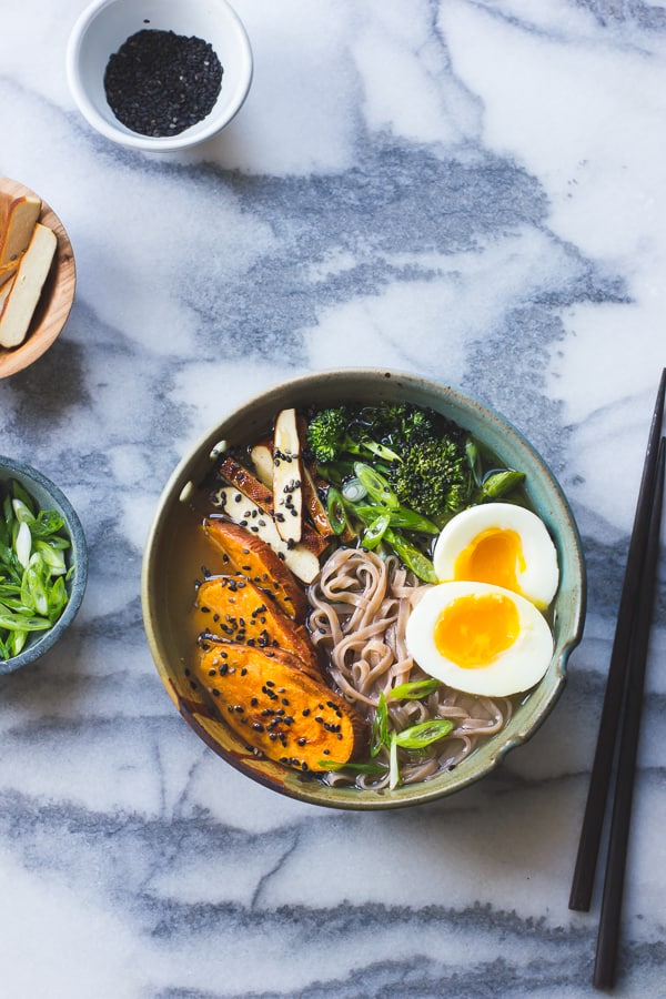 overhead shot of Vegetarian Miso Ramen with Rice Noodles, Roasted Sweet Potatoes + Sesame Broccolini