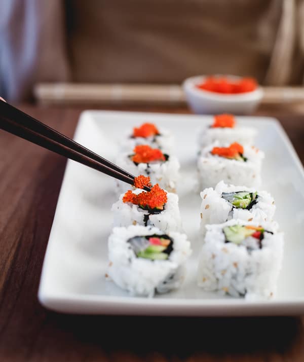 roe places on sushi 