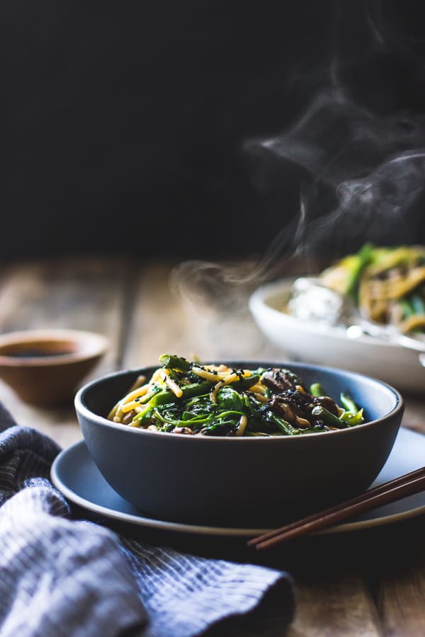 side shot of Hot Sesame Rice Noodles with Asparagus, Shiitakes and Pea Shoots