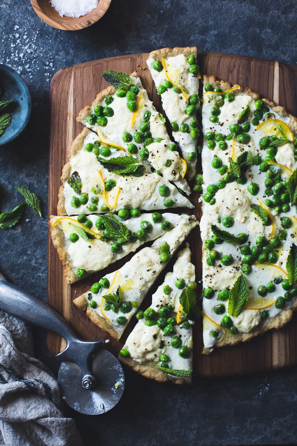 sliced Grilled Gluten-Free Pizza with Peas, Lemon + Mint