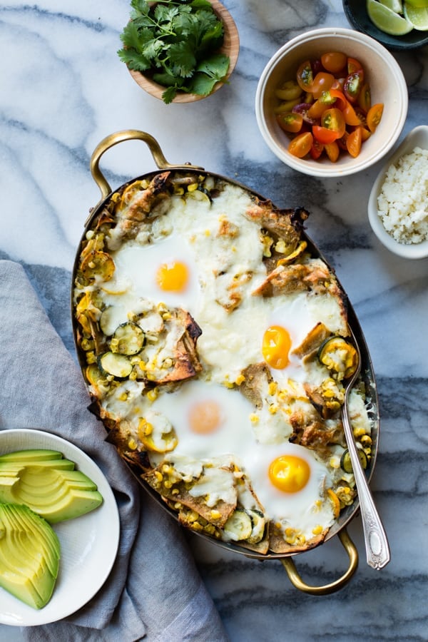 Baked Green Chilaquiles with Sweet Corn + Summer Squash on table