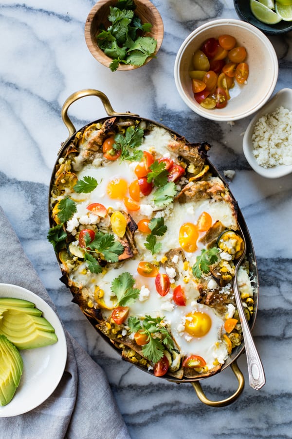 big dish of Baked Green Chilaquiles with Sweet Corn + Summer Squash