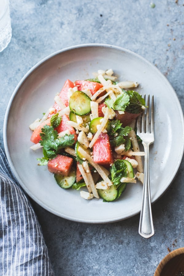 overhead shot Watermelon Jicama Salad with Cotija, Cumin and Lime