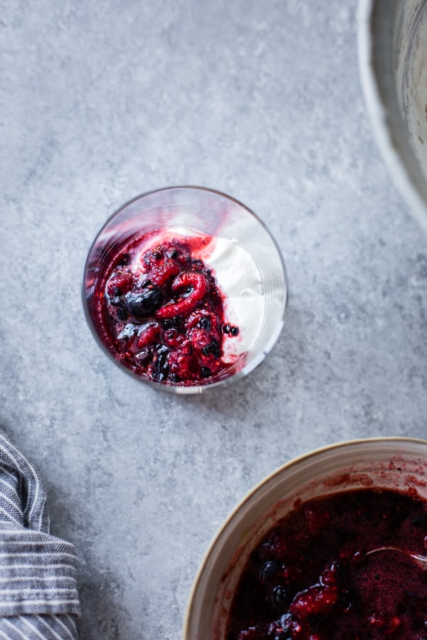 berries and yogurt in glass