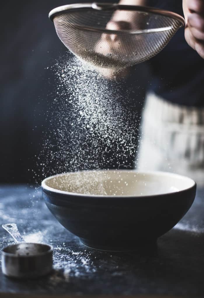 flour through sieve 