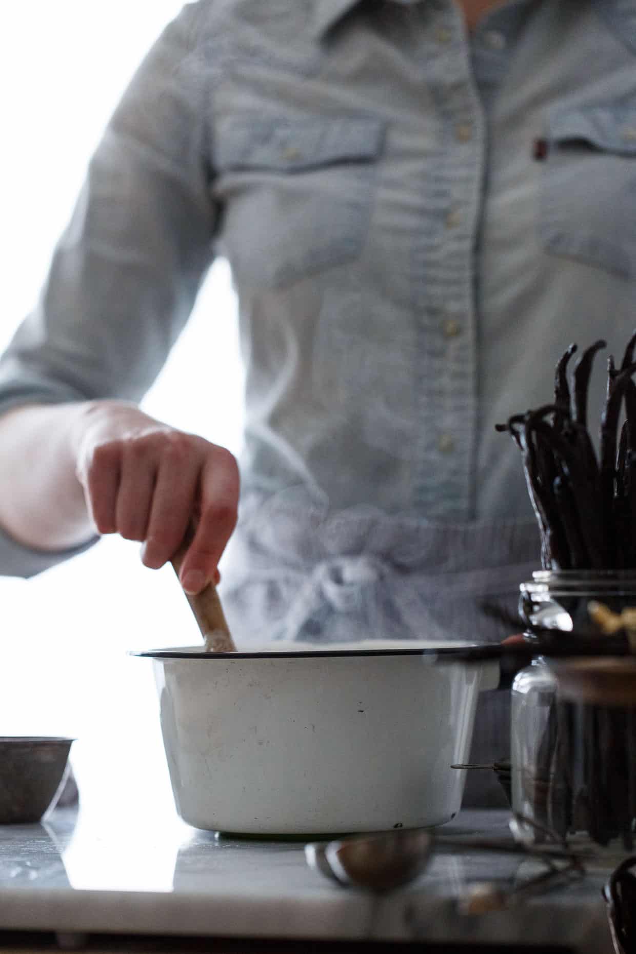 stirring Vanilla Bean Crème Brûlée mix 