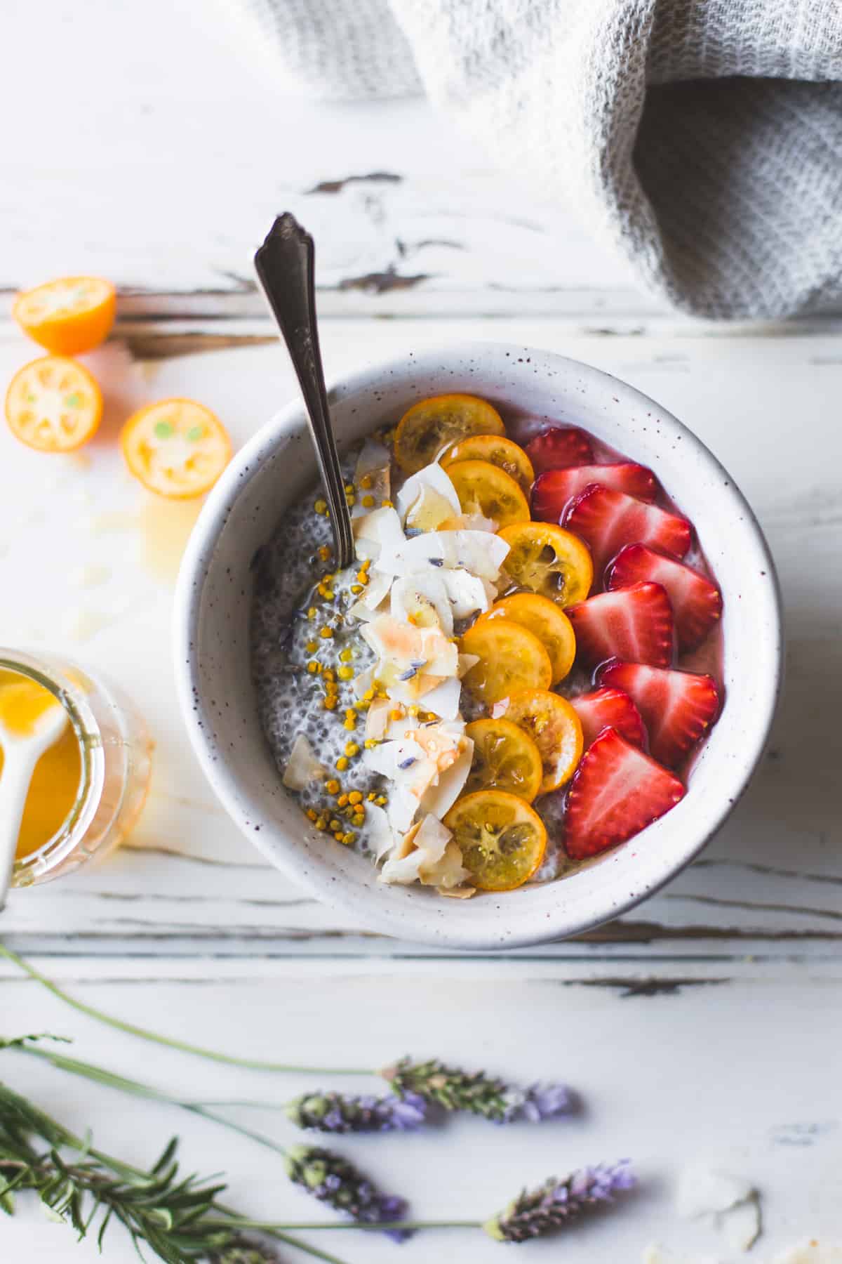 a bowl of Chia Pudding Breakfast Bowls with Kumquats, Berries & Lavender Honey {gluten-free, dairy-free}