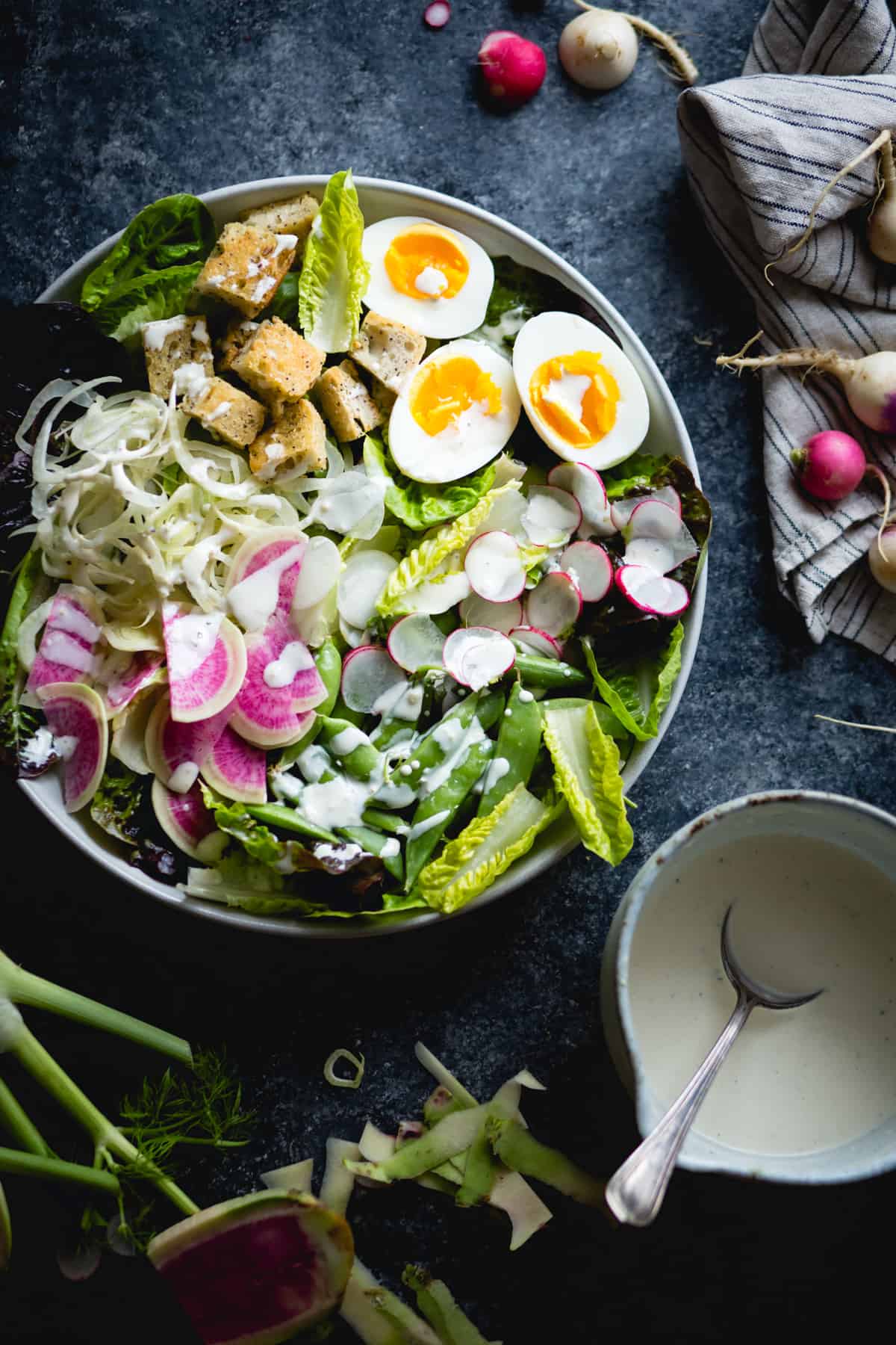 vibrant spring greens salad with fennel, radish, and miso-buttermilk dressing