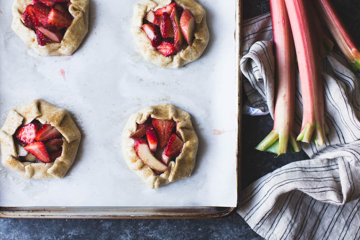 Strawberry Rhubarb Rose Galettes {gluten-free} on tray pre cooking 