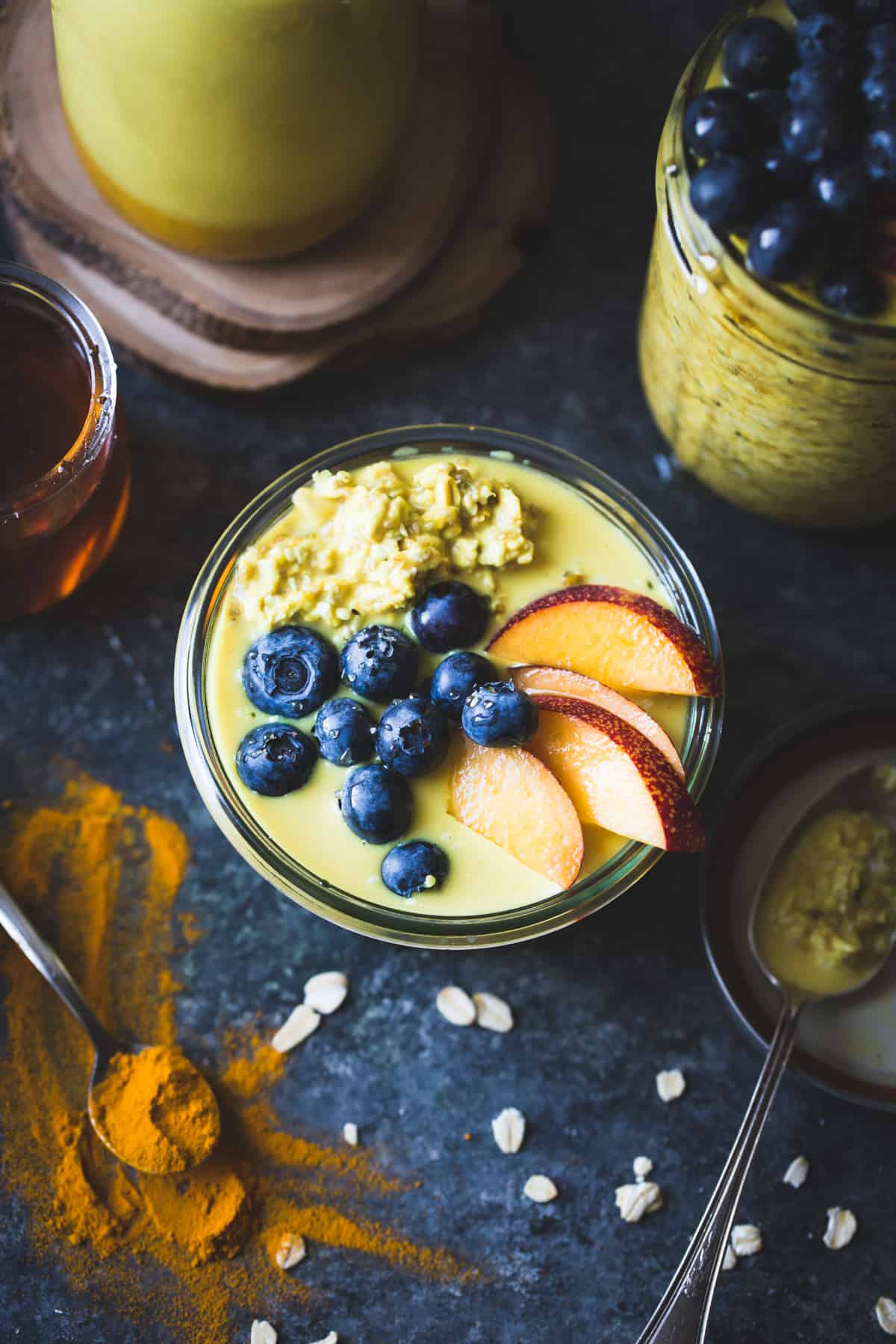 a pot of Golden Milk Overnight Oats with Turmeric, Spices, and Honey {gluten-free, vegan}