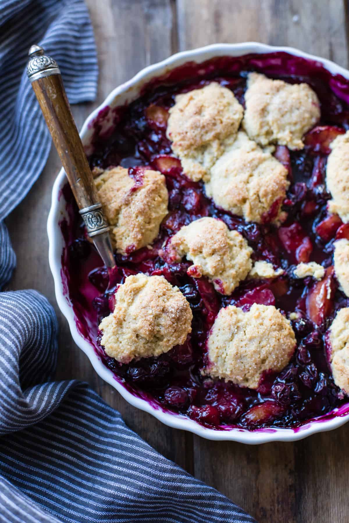 top down shot of Gluten-Free Blueberry Plum Cobbler with Corn Flour Biscuits