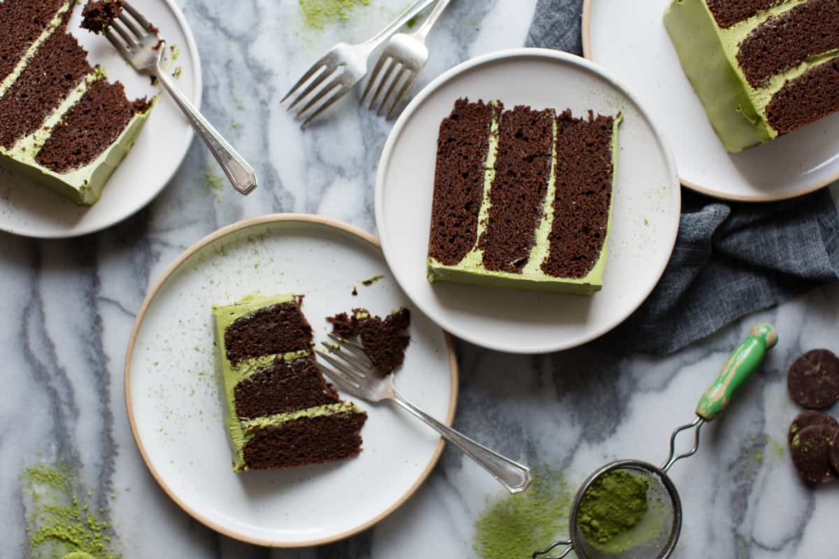 slices of Gluten Free Chocolate Zucchini Cake with Matcha Cream Cheese Frosting
