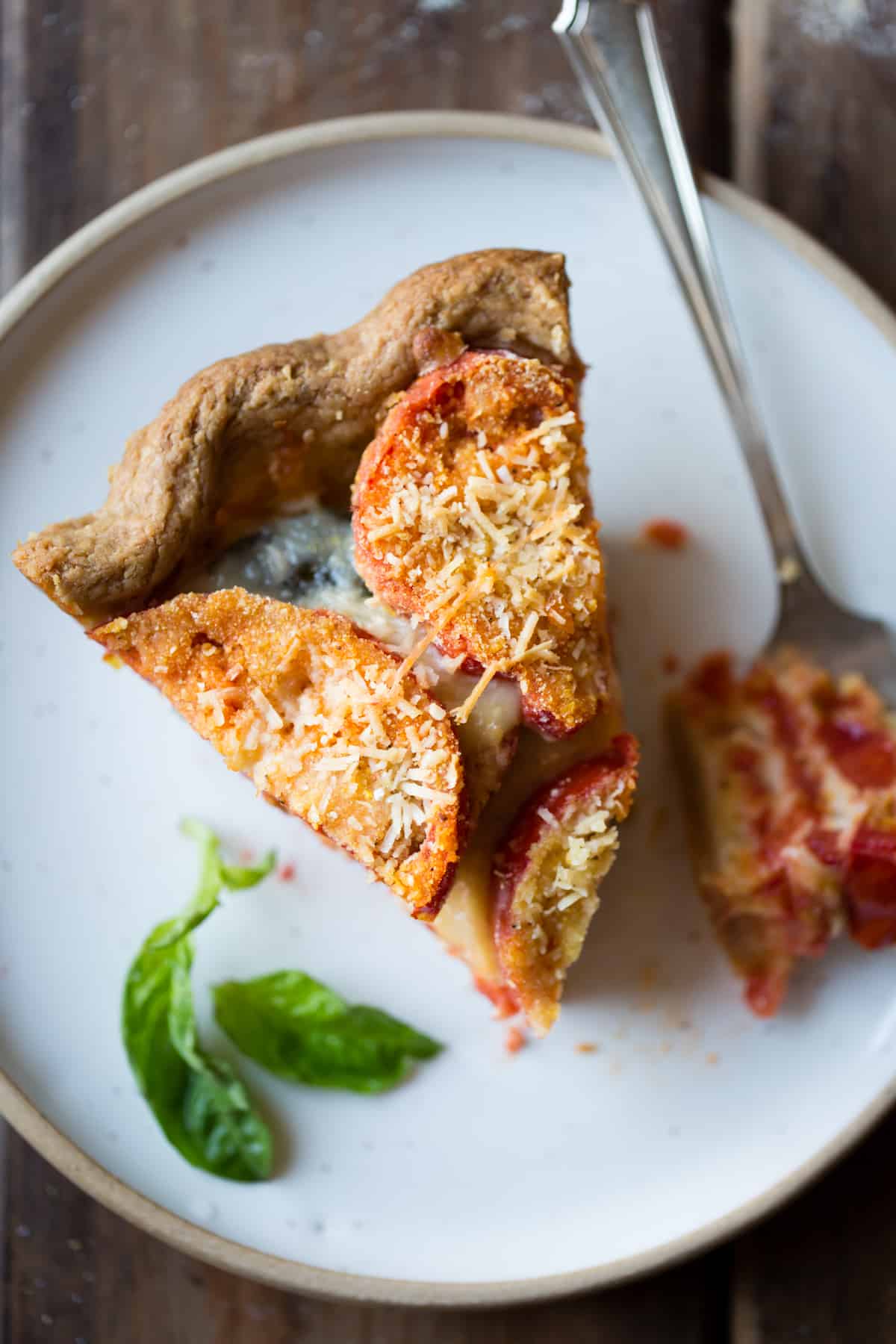 close up of Tomato Pie with Basil, Parmesan + Cornmeal {gluten-free}
