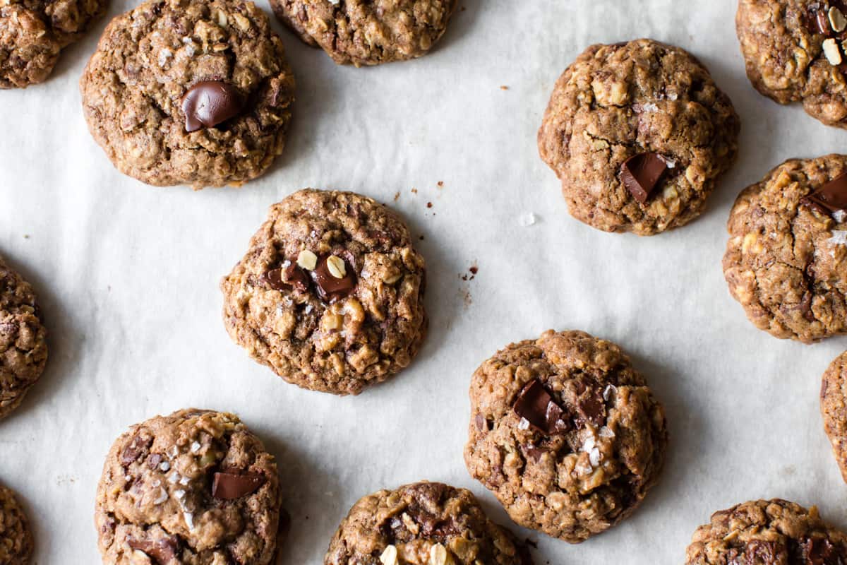 Gluten-Free Oatmeal Teff Chocolate Chip Cookies on parchment