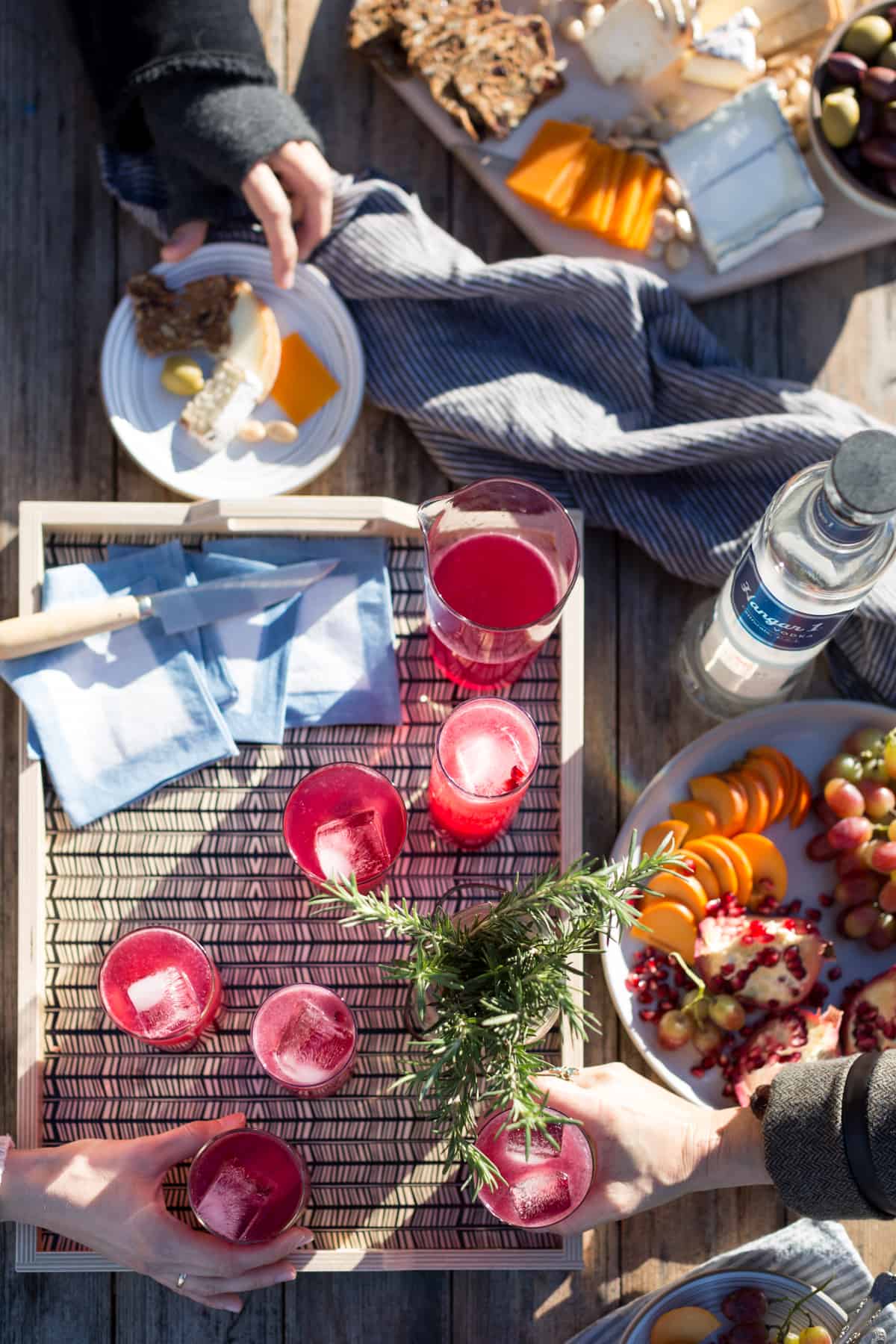 tray of Rosemary, Pomegranate, & Grilled Meyer Lemon Vodka Sparklers