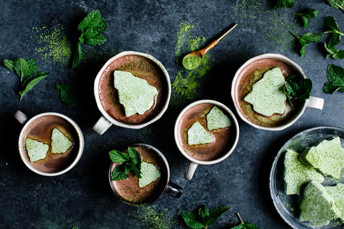 overhead shot of mugs with Fresh Mint Hot Cocoa with Matcha Marshmallows